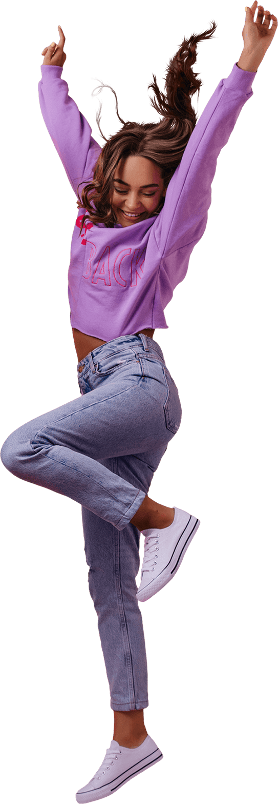 Girl Jumping with her Arms in the Air